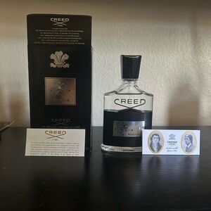 Creed Aventus Fragrance with Black and Silver Accents